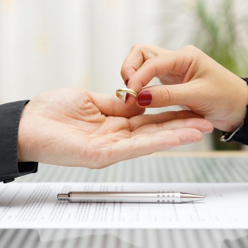 woman returned wedding ring to  husband . Divorce concept